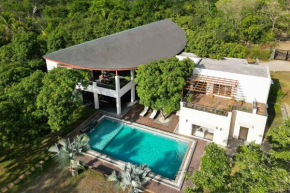 The Leaf by StayVista - An enchanting escape offering a pool, terrace, lush lawn, contemporary interiors, and indoor games